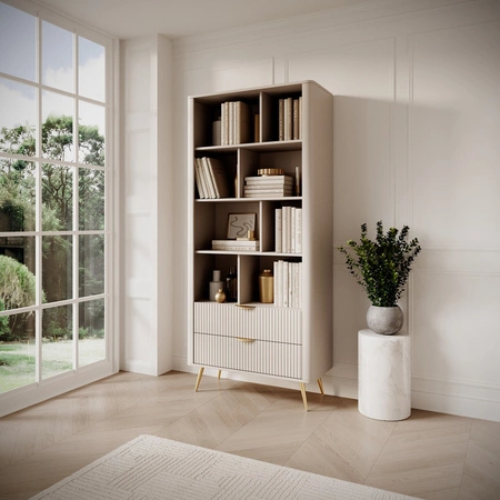 Knihovna Lante 88 cm béžová elegantní knihovna se zásuvkami designové drážkování na čelech kovové zlaté hrany úchytek