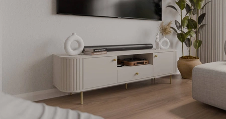 RTV skříňka Ovalio 181 cm béžová netradiční TV skříňka do obývacího pokoje kovové dekorativní doplňky frézování
