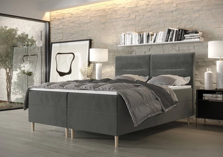Šedá kontinentální postel Voltera 140x200 v moderním skandinávském stylu s výrazným čelem