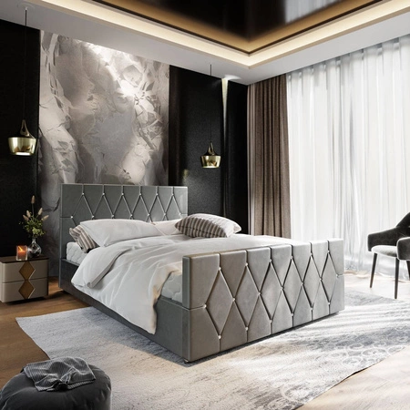 Čalouněná postel Tifton 140x200 světle šedá s úložným prostorem v moderním stylu s výrazným čelem a nohama s povrchovou úpravou krystaly