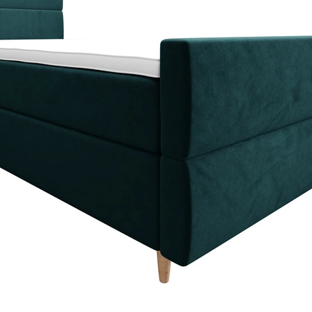 Kontinentální postel Benet 90x200 v tyrkysové barvě v moderním skandinávském stylu s čalouněným čelem a nohami postele s úložným boxem