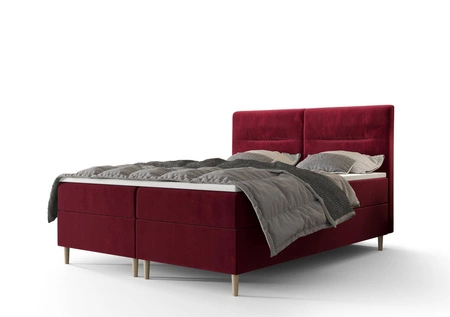Kontinentální postel Voltera 140x200 ve vínové barvě v moderním skandinávském stylu s výrazným čelem