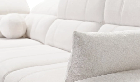 Rohová pohovka s funkcí spaní Penejos VII zelená levostranná stylová rohová pohovka s úložným prostorem na lůžkoviny pohodlné polohovatelné opěrky hlavy