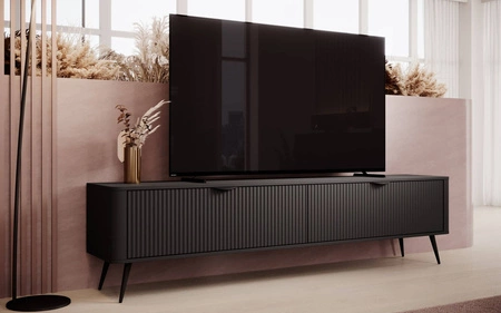 RTV skříň Lante 200 cm černá moderní design korpusu na vysokých nohách rýhované čelo charakteristický oválný tvar