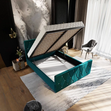 Čalouněná postel Tifton 140x200 hořčice s úložným boxem v moderním stylu s výrazným čelem a nohama s povrchovou úpravou krystaly