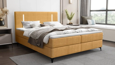 Kontinentální postel Norco 140x200 žlutá stylová postel s úložným prostorem na lůžkoviny osvětlení v čele postele dodává jedinečný nádech
