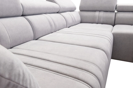 Rohová sedací souprava s funkcí spaní Castel VII grafitová pravá stylová rohová sedací souprava s úložným prostorem na lůžkoviny a nastavitelnými opěrkami hlavy