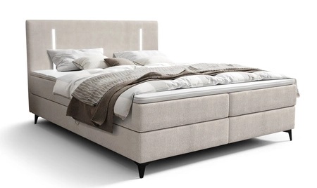 Kontinentální postel Norco 180x200 ecru Stylová postel s osvětlením kontejneru na ložní prádlo v čele postele dodává jedinečný nádech