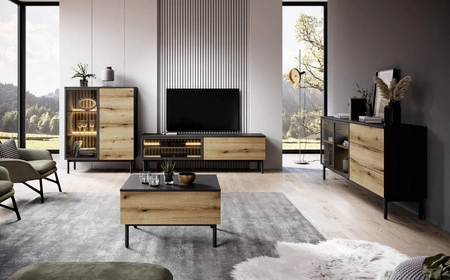 Komoda Clovis 180 cm černá / dub evokuje netradiční design komody s prosklenými čely se systémem push to open