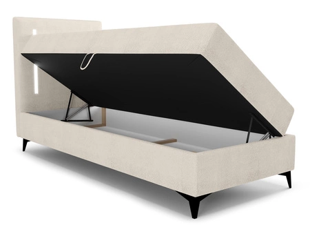 Kontinentální postel Norco 90x200 béžová Stylová postel s úložným prostorem na lůžkoviny Osvětlení v čele postele dodává posteli jedinečný nádech