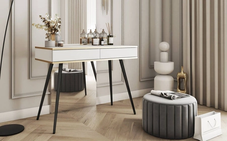 Luxusní bílá konzola se zásuvkami Stylový a elegantní toaletní stolek na vysokých černých nohách, doplněný zlatým lemováním