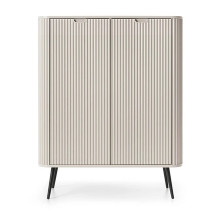 Béžová komoda Zoya 103 cm elegantní design oválného tvaru na černých kovových nohách vkusné drážkované čelo