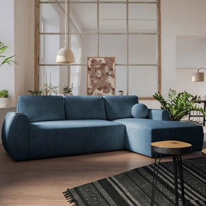 Rohová sedací souprava s funkcí spaní Colio modrá pravostranná stylová rohová sedací souprava se zajímavým tvarem velurové tkaniny s dekorativním polštářem koule