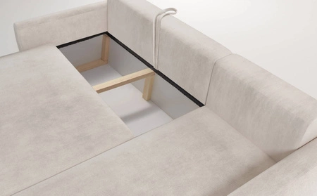 Rohová sedací souprava s funkcí spaní Colio krémová pravostranná stylová rohová sedací souprava se zajímavým tvarem velurové tkaniny s dekorativním polštářem koule