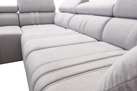 Rohová pohovka s funkcí spaní Castel VI modrá levá pohodlná a elegantní rohová pohovka se dvěma nádobami na lůžkoviny