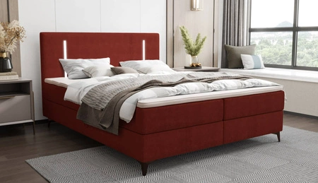 Kontinentální postel Norco 140x200 bordó Stylová postel s úložným boxem Osvětlení v čele postele dodává jedinečný nádech