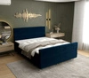 Modrá kontinentální postel Benet 140x200 v moderním skandinávském stylu s výrazným čelem a nohou