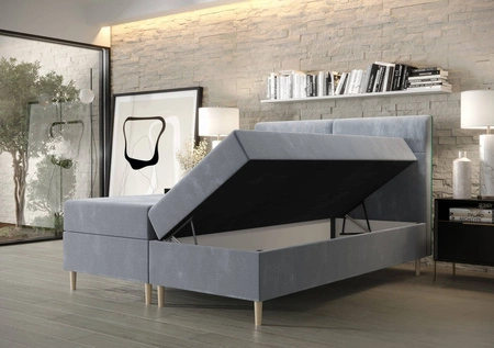 Tyrkysová kontinentální postel Voltera 140x200 v moderním skandinávském stylu s výrazným čelem