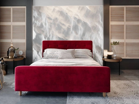 Čalouněná postel Isara 140x200 bordó s úložným prostorem v moderním skandinávském stylu s výrazným čelem a podnožkou