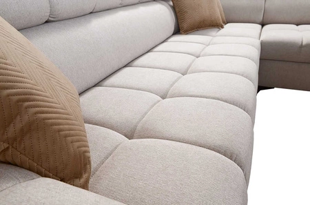 Rohová sedací souprava s funkcí spaní Bolmso II béžová pravostranná rohová sedací souprava se zásuvkou na lůžkoviny s plným výsuvem v boční části nábytku