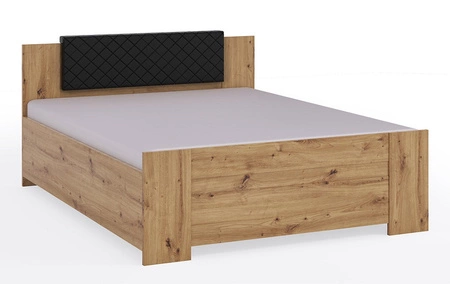 Čalouněné čelo postele Rico černé funkční a pohodlný doplněk k prošívanému čelu postele