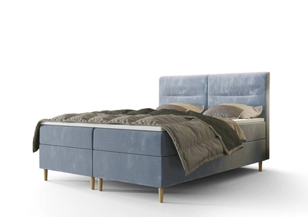 Modrá kontinentální postel Voltera 140x200 v moderním skandinávském stylu s výrazným čelem