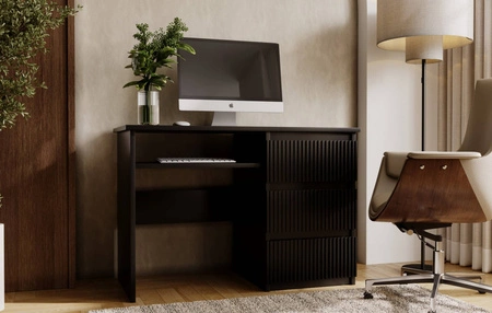 Psací stůl se zásuvkami Flexi 110 cm černý univerzální psací stůl s možností instalace zásuvek na obou stranách dekorativní drážkované čela