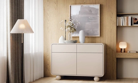 Komoda se zásuvkami Bion 108 cm béžová Designová komoda se zaoblenými tvary Originální kulovité nohy upoutají pozornost