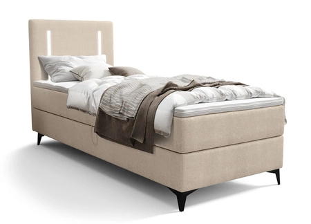 Kontinentální postel Norco 90x200 béžová Stylová postel s úložným prostorem na lůžkoviny Osvětlení v čele postele dodává posteli jedinečný nádech