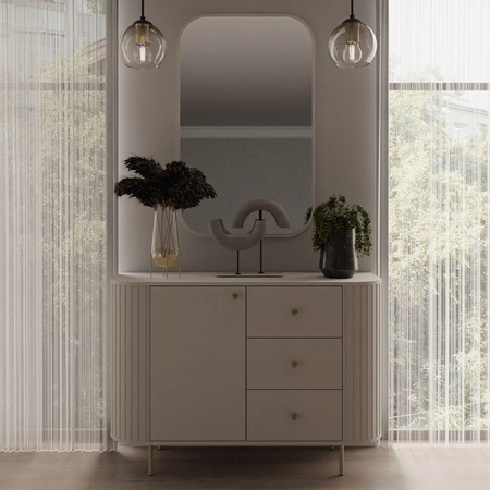 Komoda Ovalio 123 cm béžová Elegantní komoda s výjimečně stylovým designem oválného tvaru zvýrazněného frézováním