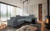 Rohová pohovka s funkcí spaní Tesalia II Lux šedá pravá pohodlná rohová pohovka s posuvným opěradlem a výsuvnou podnožkou