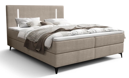 Kontinentální postel Norco 180x200 tmavě béžová Stylová postel s úložným boxem Osvětlení v čele postele dodává jedinečný nádech