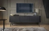 RTV skříň Zoya 168 cm černá moderní design korpusu na kovových nohách rýhované čelo charakteristický oválný tvar
