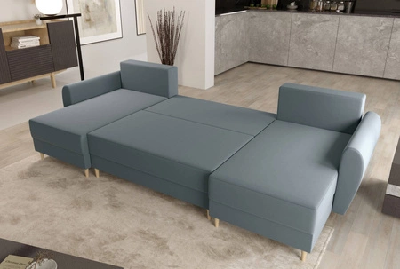 Rohová sedací souprava s funkcí spaní Rovigo U šedomodrá elegantní a pohodlná rohová sedací souprava ve skandinávském provedení s velkým prostorem na lůžkoviny