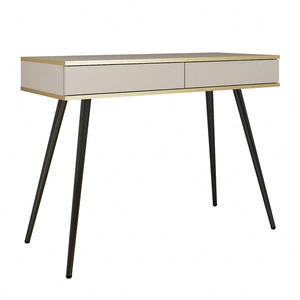 Luxusní béžová konzola se zásuvkami stylový a elegantní toaletní stolek na vysokých černých nohách doplněný zlatým lemováním