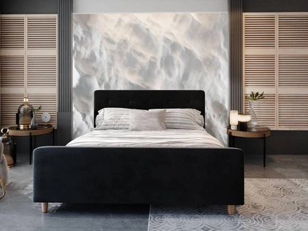 Čalouněná postel Isara 140x200 černá s úložným prostorem v moderním skandinávském stylu s výrazným čelem a podnožkou