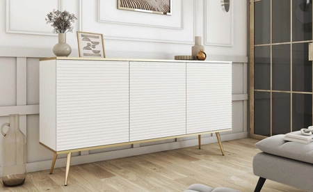 Luxusní komoda 160 cm bílá elegantní design stylová drážkovaná čela korpus komody doplněný zlatým lemováním zlaté kovové nohy
