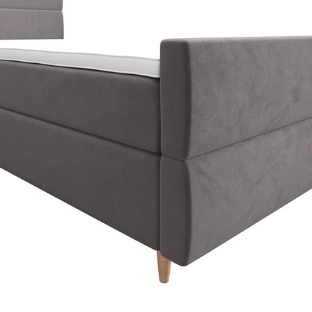 Kontinentální postel Benet 100x200 světle šedá v moderním skandinávském stylu s čalouněným čelem a nohou postele s úložným boxem