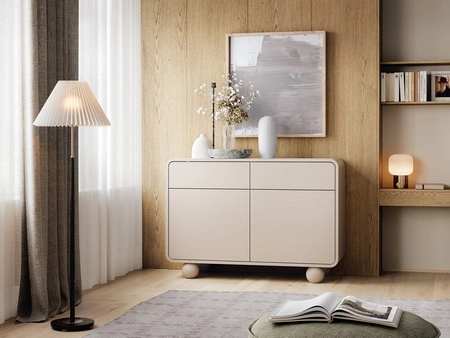 Komoda se zásuvkami Bion 108 cm béžová Designová komoda se zaoblenými tvary Originální kulovité nohy upoutají pozornost