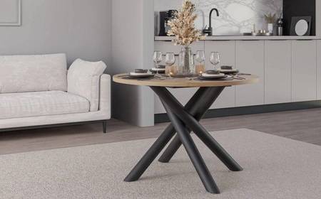 Kulatý stůl Lyon 110 cm dub artisan / černý designový jídelní stůl na kovových pavoučích nohách výškově nastavitelný