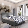 Šedá čalouněná postel Reus 140x200 s moderním čelem ideální do ložnice
