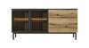 Komoda Clovis 180 cm černá / dub evokuje netradiční design komody s prosklenými čely se systémem push to open