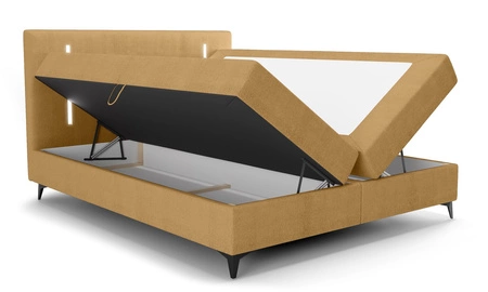 Kontinentální postel Norco 140x200 žlutá stylová postel s úložným prostorem na lůžkoviny osvětlení v čele postele dodává jedinečný nádech