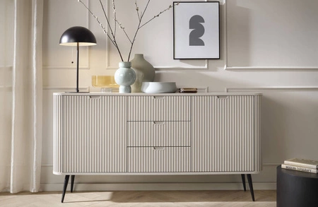 Komoda Zoya 168 cm béžová elegantní design oválný tvar na kovových nohách vkusné drážkované čelo