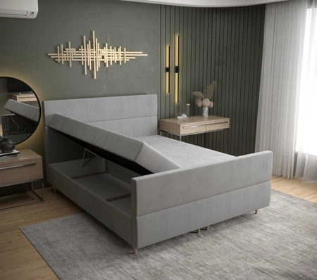 Kontinentální postel Benet 140x200 hořčice v moderním skandinávském stylu s výrazným čelem a nohou